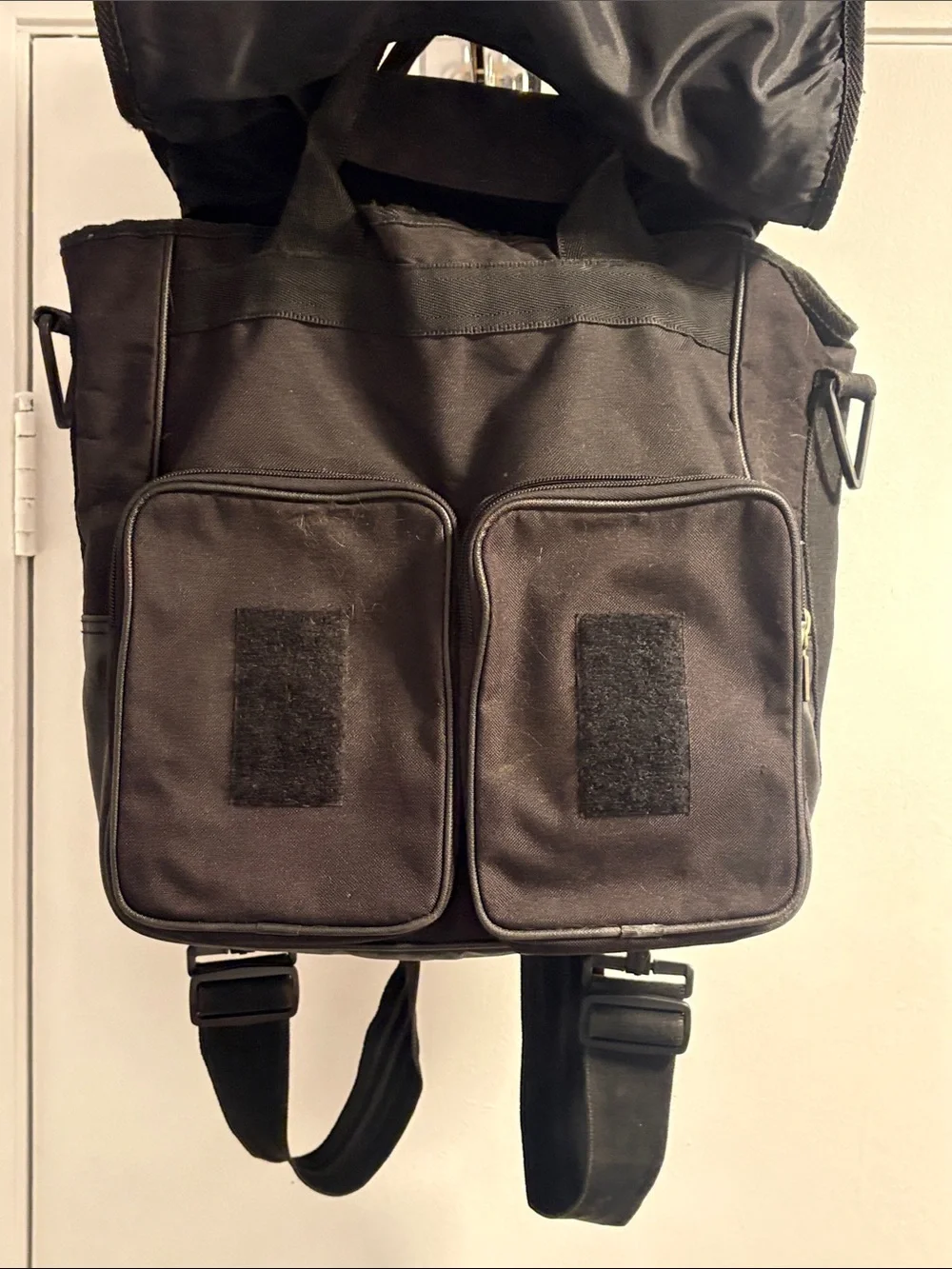 Diesel Vintage Black Canvas Backpack with Red Logo Accent.